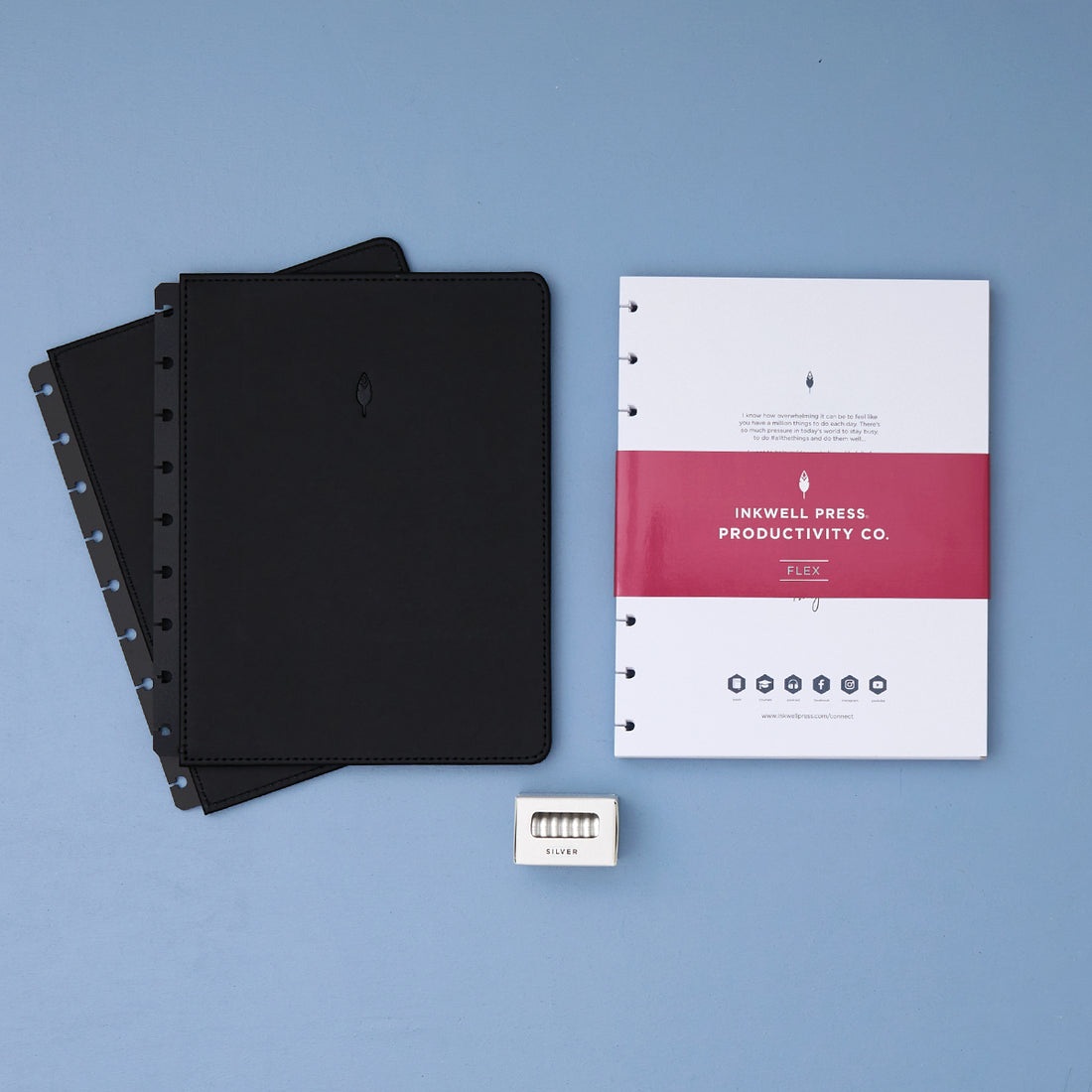 2026 planner in 7x9 size featuring black cover, silver discs, and flex horizontal planning weekly layout